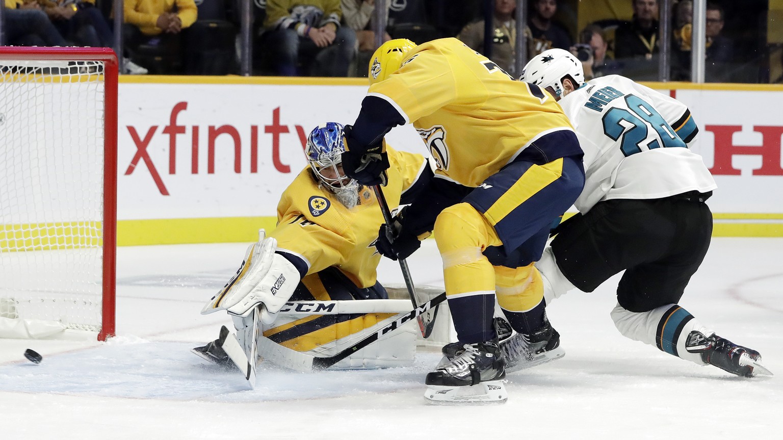 San Jose Sharks right wing Timo Meier (28), of Switzerland, scores against Nashville Predators goaltender Juuse Saros, left, of Finland, in the first period of an NHL hockey game Tuesday, Oct. 23, 201 ...