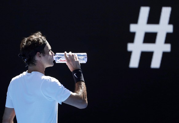 epa07252420 (FILE) - Roger Federer of Switzerland drinks water during a break against Marton Fucsovics of Hungary during their fourth round match of the Australian Open (AO) tennis tournament in Melbo ...