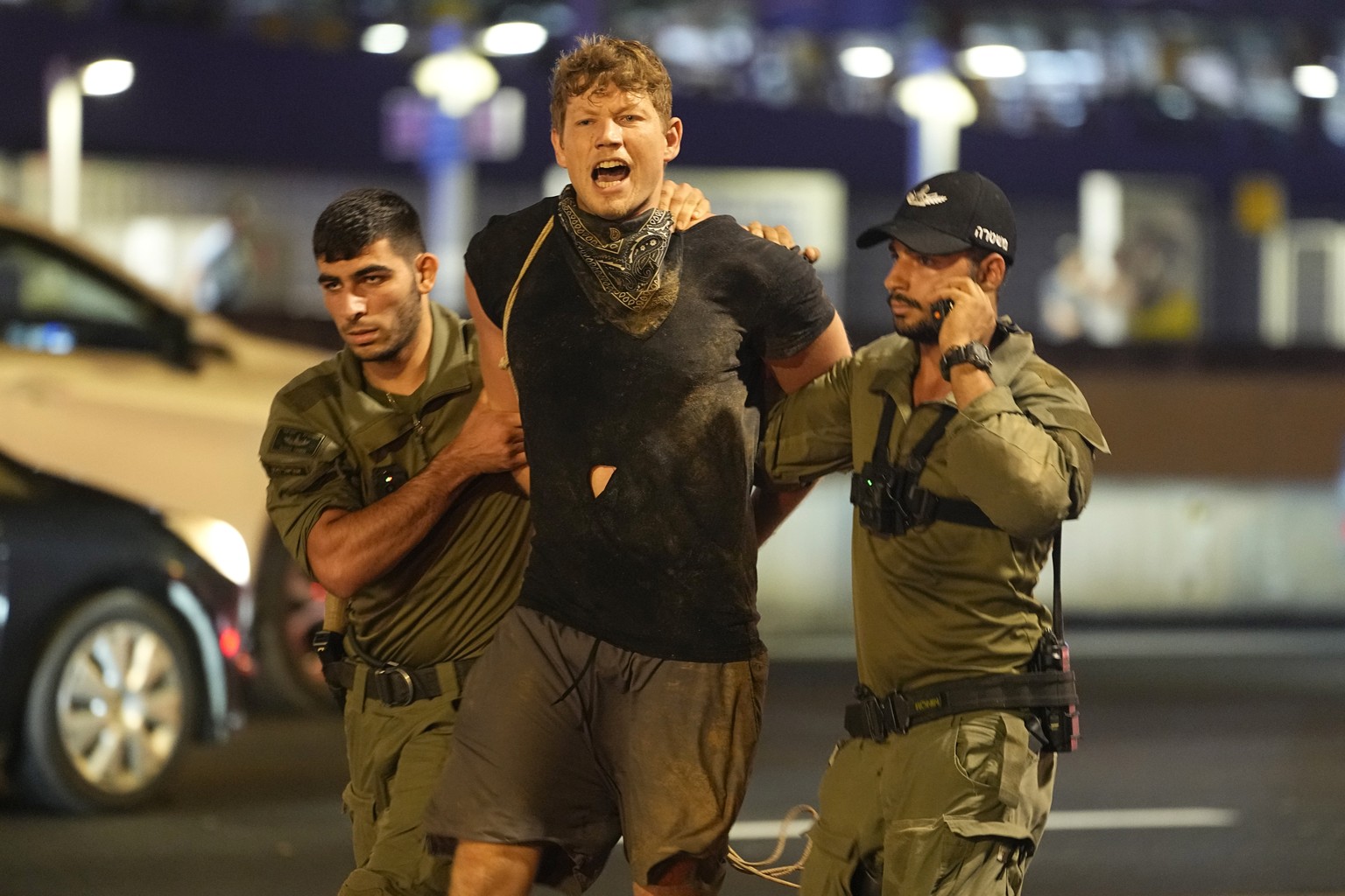 A protester is detained after a demonstration against plans by Prime Minister Benjamin Netanyahu&#039;s government to overhaul the judicial system, in Tel Aviv, Thursday, July 20, 2023. (AP Photo/Ohad ...