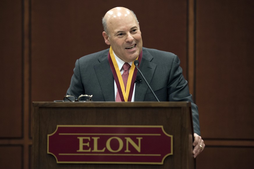 FILE - In this March 1, 2017, file photo, then Elon Trustee Louis DeJoy is honored with Elon's Medal for Entrepreneurial Leadership in Elon. N.C. U.S. Sen. Joe Manchin and union officials say the U.S. ...