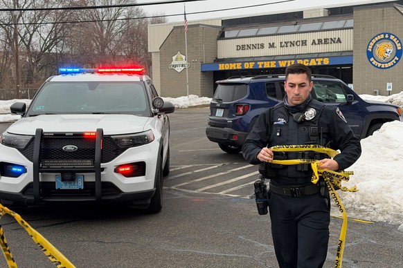 Police continue to tape off the Dennis M. Lynch arena a day after a deadly shooting during a youth hockey game on Tuesday, Feb. 17, 2026 in Pawtucket, R.I. (AP Photo/Rodrique Ngowi)
Ice Rink-Shooting