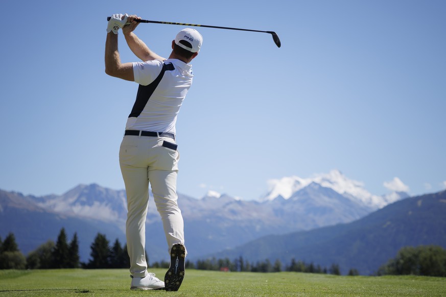 Joel Girrbach from Switzerland hits a tee shot during the fourth and final round of the DP World Tour Omega European Masters Golf Tournament, in Crans-Montana, Switzerland, Sunday, August 31, 2025. (K ...