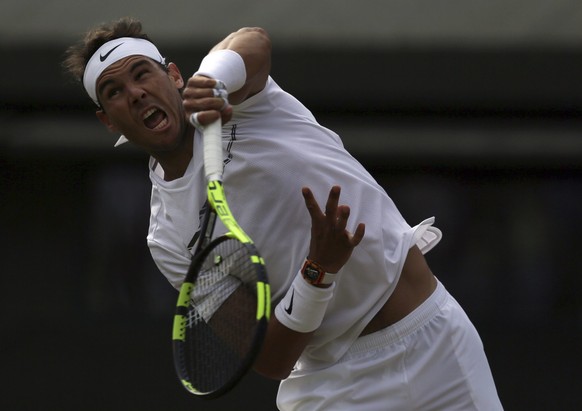 Spain&#039;s Rafael Nadal serves to Luxembourg&#039;s Gilles Muller during their Men&#039;s Singles Match on day seven at the Wimbledon Tennis Championships in London Monday, July 10, 2017. (AP Photo/ ...