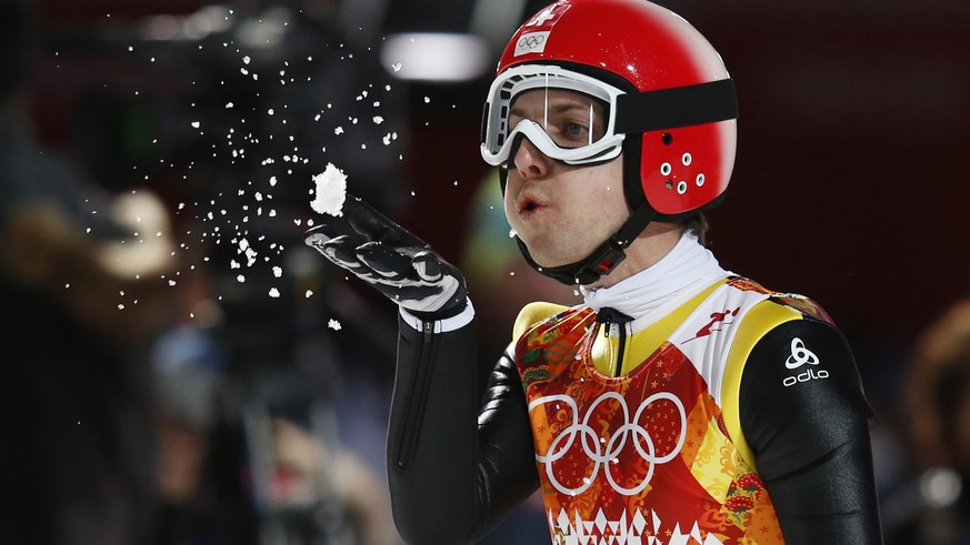 ZUM WEITERFUEHRUNG DER KARRIERE VON SIMON AMMANN STELLEN WIR IHNEN FOLGENDES BILDMATERIAL ZUR VERFUEGUNG - Simon Ammann of Switzerland reacts after his second jump during the men&#039;s ski jumping LH ...