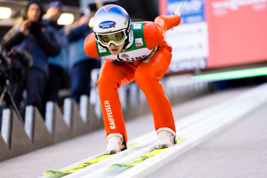 Gregor Deschwanden of Switzerland speeds down the inrun slope during the men's FIS Ski Jumping World Cup competition at the Gross-Titlis Schanze on Saturday, December 20, 2025 in Engelberg, Switz ...