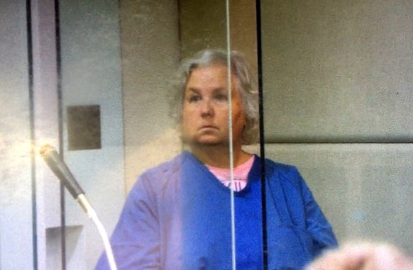 FILE - In this screen shot from video of her court appearance, romance writer Nancy Crampton Brophy appears in Multnomah County Circuit Court in Portland, Ore., on Sept. 6, 2018, on one count of murde ...