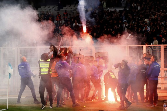 epa09929165 Supporters light flares during the UEFA Conference League semifinal, second leg soccer match between Olympique Marseille vs Feyenoord Rotterdam at Stade Velodrome in Marseille, France, 05  ...