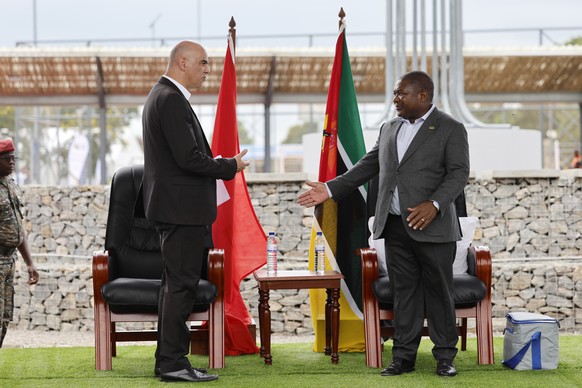 Mozambican President Filipe Jacinto Nyusi, right, and Swiss Federal President Alain Berset attend the inauguration of &quot;la Place du Metical&quot; in Mueda, Mozambique, Thursday, February 9, 2023.  ...