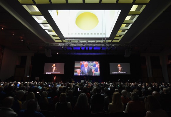 epa07110426 People observe Australian Prime Minister Scott Morrison delivering the National Apology to victims and survivors of Institutional Child Sexual Abuse at Parliament House in Canberra, Austra ...