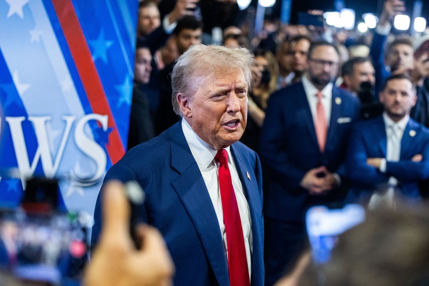 epa11597703 Republican presidential nominee and former US president Donald Trump speaks to members of the media following his presidential debate with Vice President Kamala Harris in the debate&#039;s ...