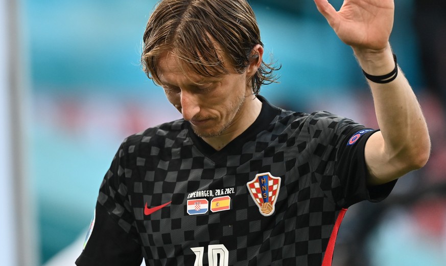 epa09309085 Luka Modric of Croatia reacts after the UEFA EURO 2020 round of 16 soccer match between Croatia and Spain in Copenhagen, Denmark, 28 June 2021. EPA/Stuart Franklin / POOL (RESTRICTIONS: Fo ...