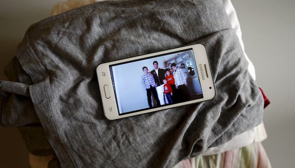 The personal belongings of 32-year old refugee Mohammed Shed from Afghanistan are photographed just after his arrival at a refugee camp built in former U.S. army barracks in Hanau, Germany, August 18, ...