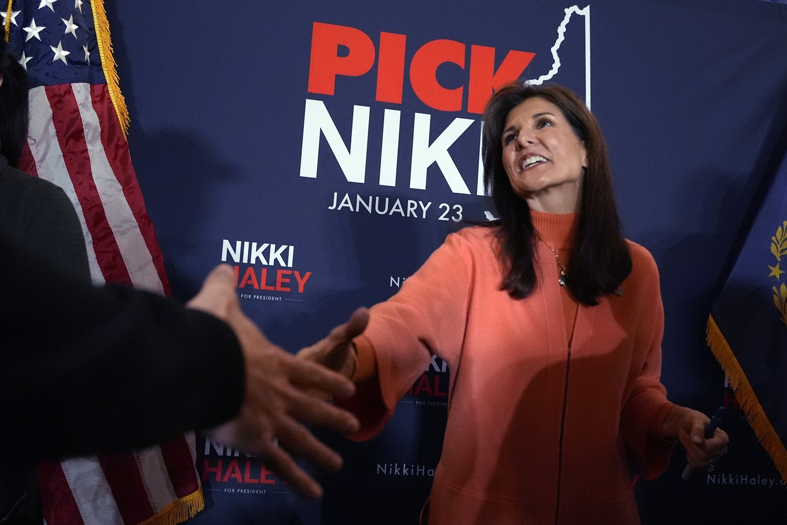 Republican presidential candidate former UN Ambassador Nikki Haley shakes hands during a campaign stop, Tuesday, Jan. 16, 2024, in Bretton Woods, N.H. (AP Photo/Charles Krupa)