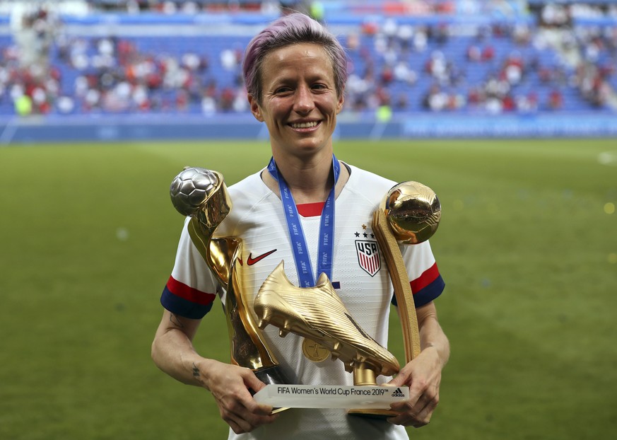 United States&#039; Megan Rapinoe poses with her individual awards at the end of the Women&#039;s World Cup final soccer match between US and The Netherlands at the Stade de Lyon in Decines, outside L ...