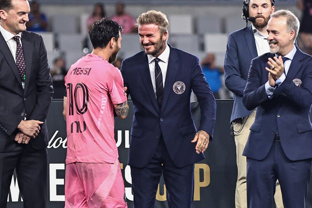 MIAMI, FL - SEPTEMBER 16: Inter Miami CF Forward Lionel Messi 10 celebrates with Inter Miami CF owner, David Beckham, during the post match ceremony at the 2026 Michelob ULTRA Campeones Cup soccer mat ...