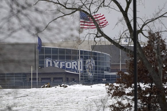 Oxford High School is shown in Oxford, Mich., Tuesday, Nov. 30, 2021, where authorities say a student opened fire at the school. (AP Photo/Paul Sancya)