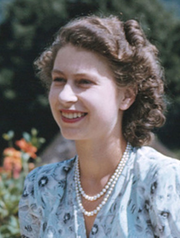 Britain&#039;s Queen Elizabeth II, then Princess Elizabeth, sits in Natal National Park, South Africa, on her 21st birthday, in April 21, 1947. In the background are the Drakenberg Mountains. The Quee ...