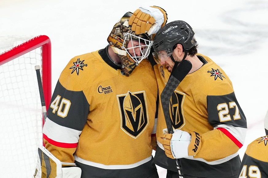 NHL, Eishockey Herren, USA Nashville Predators at Vegas Golden Knights Jan 17, 2026 Las Vegas, Nevada, USA Vegas Golden Knights defenseman Shea Theodore 27 congratulates goaltender Akira Schmid 40 aft ...