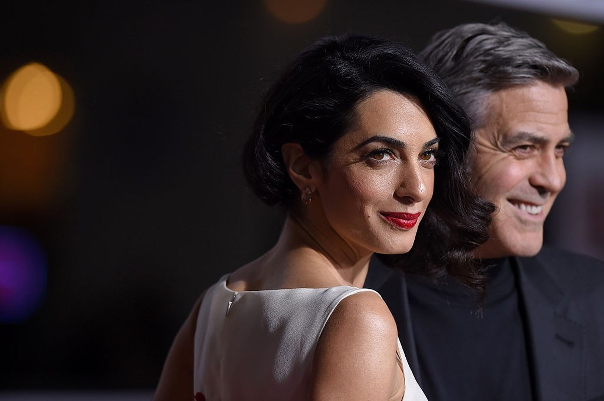 WESTWOOD, CA - FEBRUARY 01: Amal Clooney and actor George Clooney arrive at the premiere of Universal Pictures' 'Hail, Caesar!' at Regency Village Theatre on February 1, 2016 in Westwoo ...