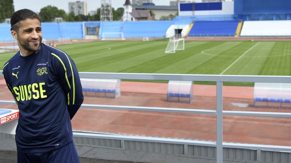 Switzerland&#039;s defender Ricardo Rodriguez smiles during a TV interview after a training session of the Switzerland&#039;s national soccer team at the Torpedo Stadium, in Togliatti, Russia, Thursda ...