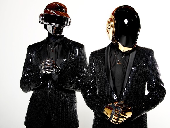 FILE - In this April 17, 2013 file photo, Thomas Bangalter, left, and Guy-Manuel de Homem-Christo, from the music group, Daft Punk, pose for a portrait in Los Angeles. Daft Punk has five nominations a ...