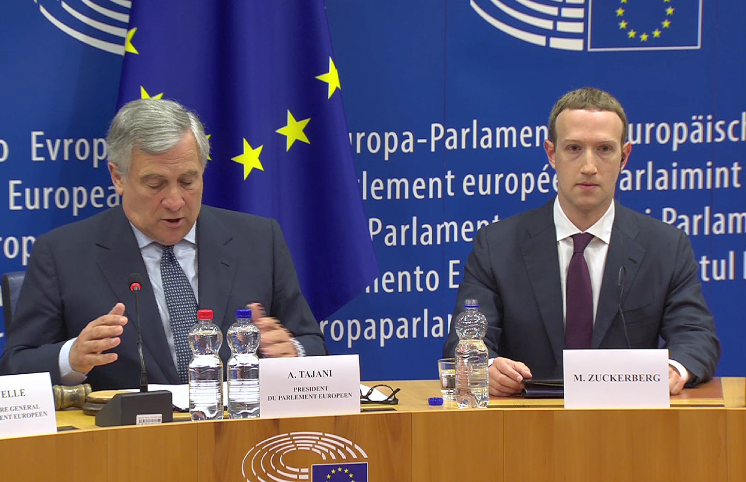 epa06756255 A handout video-grabbed photo made available by the European Parliament on 22 May 2018, showing the founder and CEO of Facebook Mark Zuckerberg (R) and Antonio Tajani (L), President of the ...
