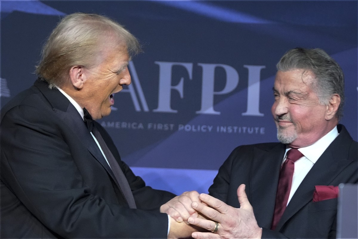 President-elect Donald Trump greets actor Sylvester Stallone during an America First Policy Institute gala at his Mar-a-Lago estate, Thursday, Nov. 14, 2024, in Palm Beach, Fla. (AP Photo/Alex Brandon ...