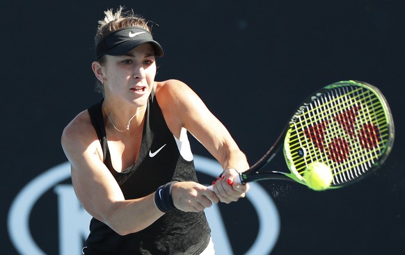 epa07281814 Belinda Bencic of Switzerland in action during her women&#039;s singles match against Katerina Siniakova of Czech Republic on day one of the Australian Open Grand Slam tennis tournament in ...