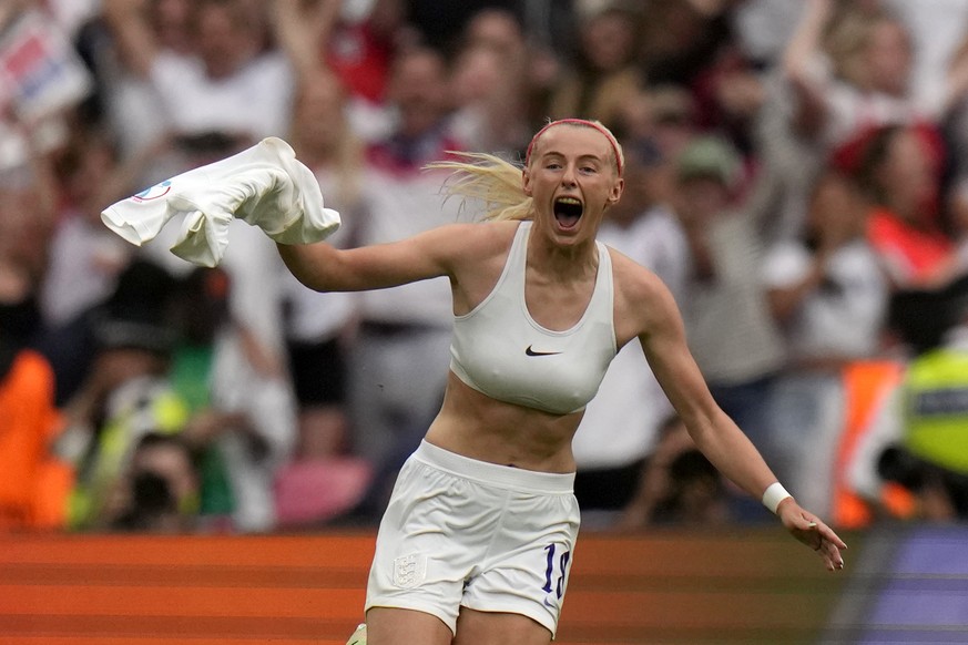 FILE - England&#039;s Chloe Kelly takes off her shirt celebrating after scoring her side&#039;s second goal during the Women&#039;s Euro 2022 final soccer match between England and Germany at Wembley  ...