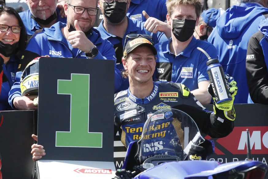 epa09882530 Swiss rider Dominique Aegerter of Yamaha celebrates his victory at the Supersport Race 2 within the Superbikes 2022 of the 2022 FIM Superbike World Championship at MotorLand Aragon circuit ...