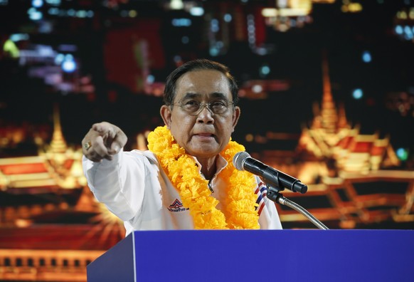 epa10563429 Incumbent Thai Prime Minister and United Thai Nation Party&#039;s prime ministerial candidate Prayut Chan-o-cha speaks to supporters during a general election campaign in Bangkok, Thailand ...