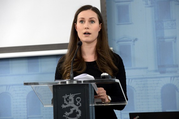 Prime Minister Sanna Marin gives a press conference to announce measures to combat the coronavirus outbreak, in Helsinki, Finland, Tuesday March 17, 2020. For most people, the new COVID-19 coronavirus ...