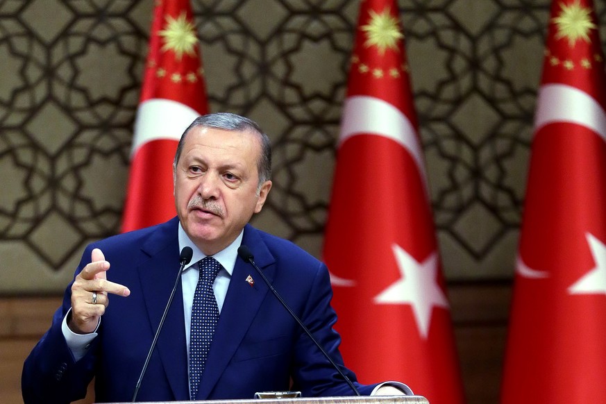 Turkey&#039;s President Recep Tayyip Erdogan speeches to the heads of chambers of commerce in Ankara, Turkey, on Thursday, Aug. 4, 2016. Erdogan vowed to go after businesses linked to a US-based Musli ...