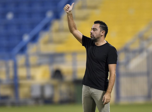 epa09554967 Head coach of Al Sadd, Xavi Hernandez, reacts during the Qatar Stars League soccer match between Al Sadd and Al Ahli in Doha, Qatar, 30 October 2021. EPA/NOUSHAD THEKKAYIL