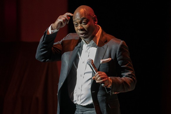 Dave Chappelle performs during a theater dedication ceremony honoring the comedian and actor, and to raise funds to support Duke Ellington School of the Arts in Washington, Monday, June. 20, 2022. (AP ...