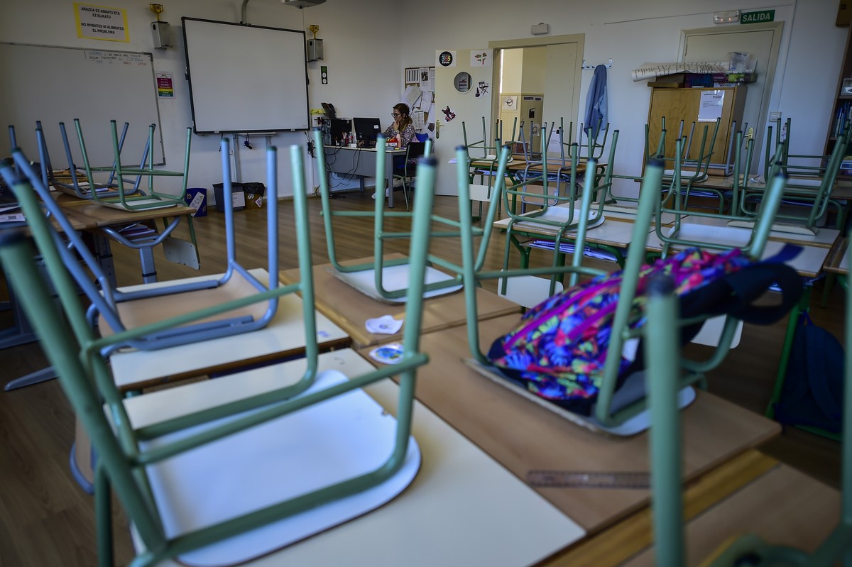 A teacher sits in a classroom in a public school in the small Spanish Basque village of Labastida, around 45 kms (24,85 miles) from Vitoria, northern Spain, Wednesday, March 11, 2020. Spain's hea ...