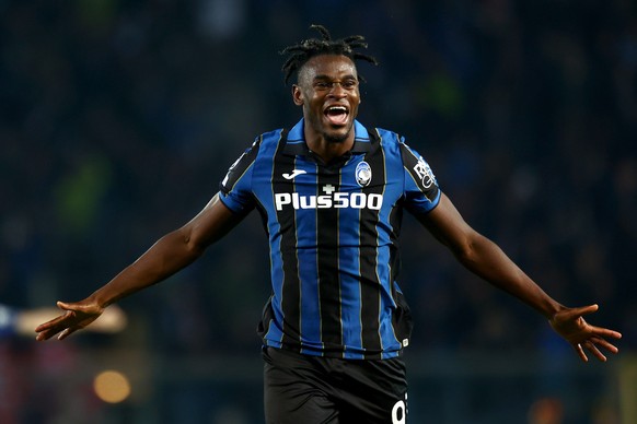 epa09560387 Atalanta&#039;s Duvan Zapata celebrates after scoring the 2-1 goal during the UEFA Champions League group F soccer match between Atalanta BC and Manchester United at the Gewiss stadium in  ...