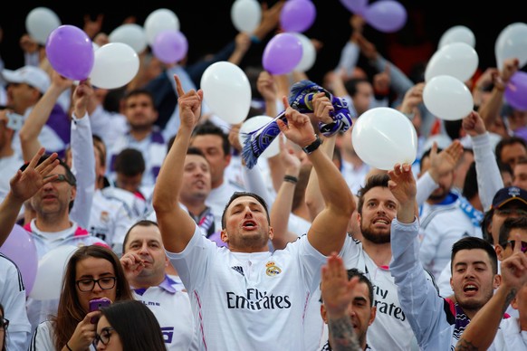 MADRID, SPAIN - APRIL 14: Real Madrid fans soak up the pre-match atmopshere ahead of the UEFA Champions League Quarter Final First Leg match between Club Atletico de Madrid and Real Madrid CF at Vicen ...