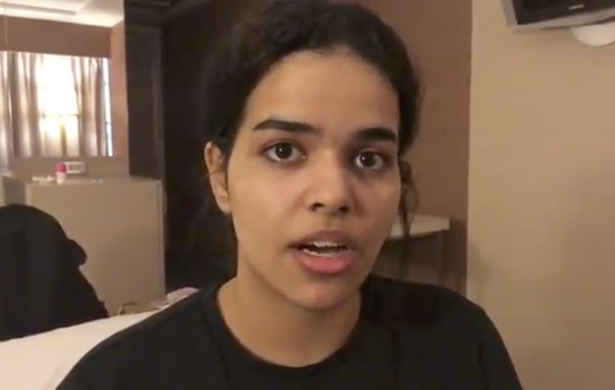 CLARIFIES SPELLING OF NAME: In this Monday, Jan. 7, 2019, image made from video released by Rahaf Mohammed Alqunun/Human Rights Watch, Rahaf Mohammed Alqunan views her mobile phone as she sits barrica ...