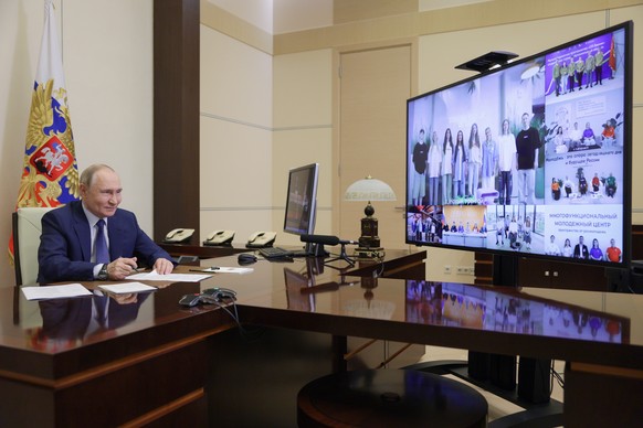 epa12202736 Russian President Vladimir Putin (L) attends a ceremony to open new youth centres in Russian regions via videoconference at the Novo-Ogaryovo state residence, outside Moscow, 28 June 2025. ...