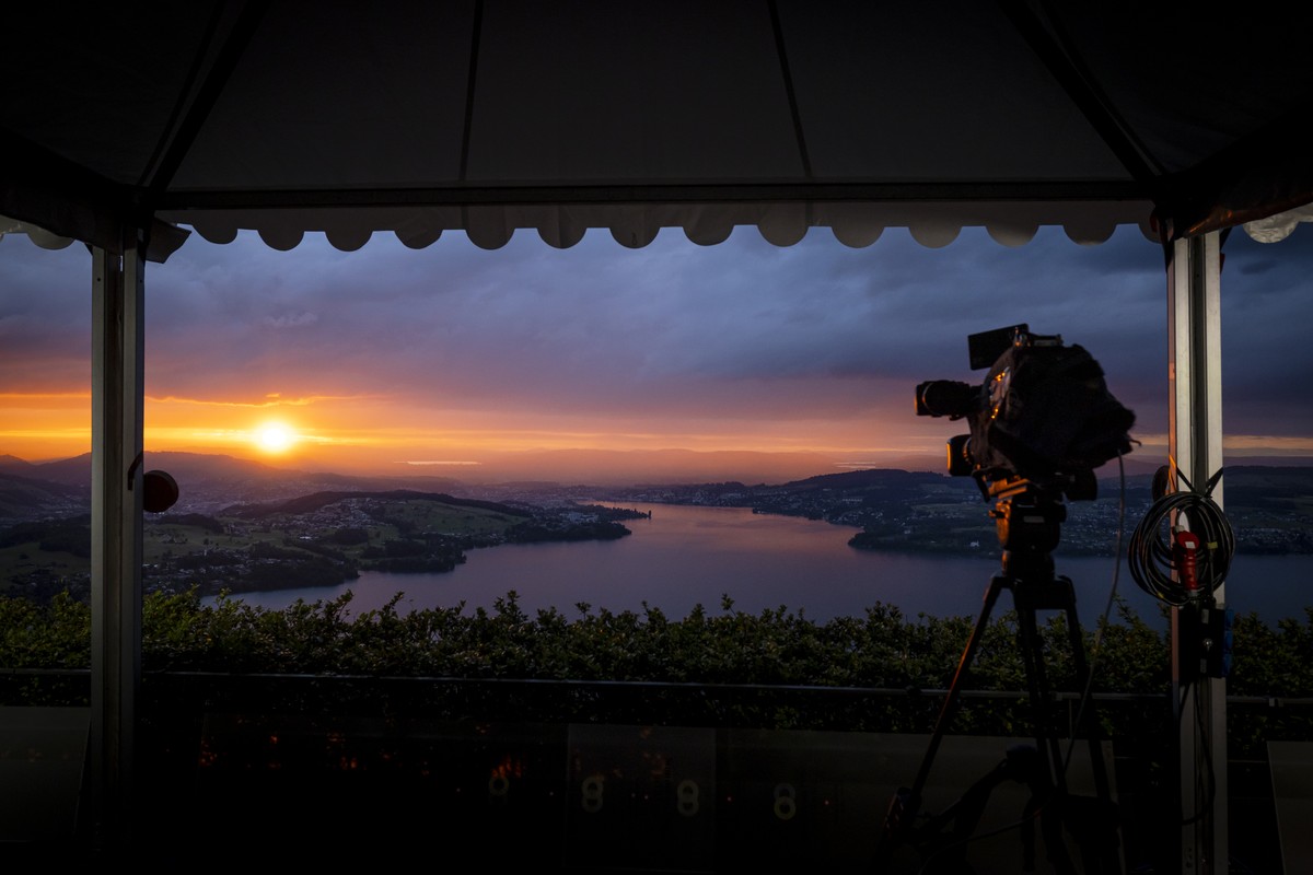 A broadcast camera is seen in front of the Lake Lucerne at sunset during the Summit on peace in Ukraine, in Stansstad near Lucerne, Switzerland, Saturday, June 15, 2024. Heads of state from around the ...