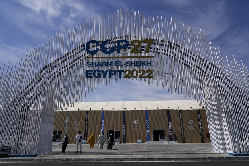 Guests enter the convention center hosting the COP27 U.N. Climate Summit, Friday, Nov. 4, 2022, prior to the start of the summit on Nov. 6, which is scheduled to end on Nov. 18, in Sharm el-Sheikh, Eg ...
