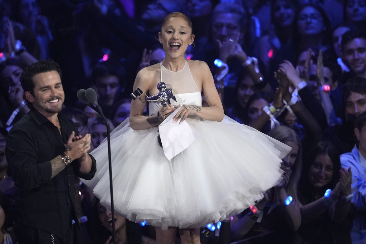 Christian Breslauer, left, and Ariana Grande accept the award for video of the year for "Brighter Days Ahead" during the MTV Video Music Awards on Sunday, Sept. 7, 2025, at UBS Arena in Elmo ...