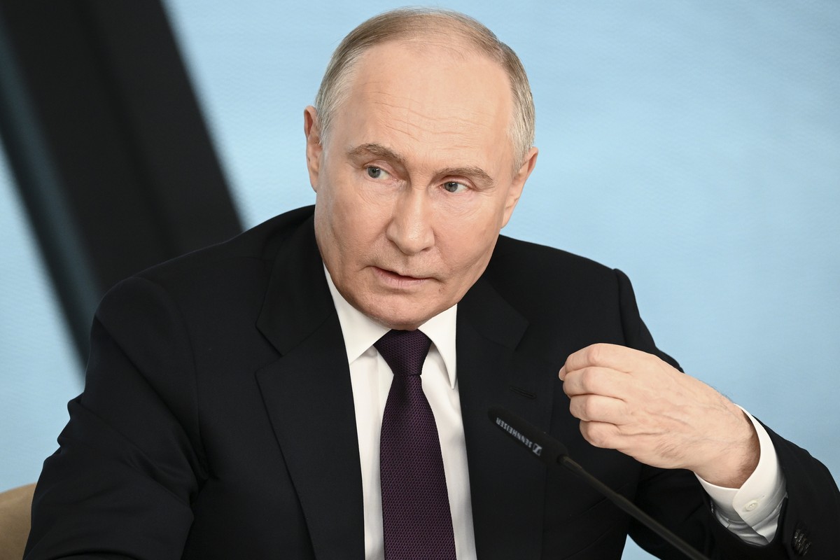 Russian President Vladimir Putin speaks to senior news leaders of international news agencies on the sidelines of the St. Petersburg International Economic Forum at the Lakhta Center skyscraper, the h ...