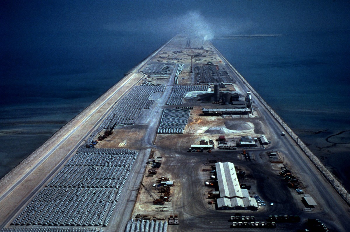 The deep water port of Yanbu, an artificial land fill pier stretching out into the Persian Gulf in Saudi Arabia. The deep water port of Yanbu, an artificial land fill pier stretching out into the Pers ...