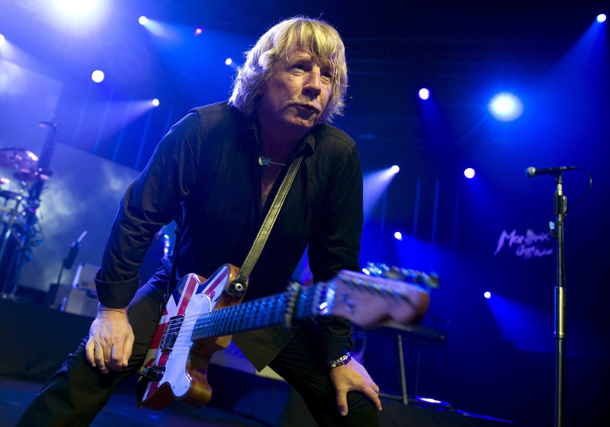File --- A file photo dated 16 July 2009 showing guitarist and singer Rick Parfitt of British rock group Status Quo performing in the Stravinski Hall stage at the 43rd Montreux Jazz Festival, in Montr ...