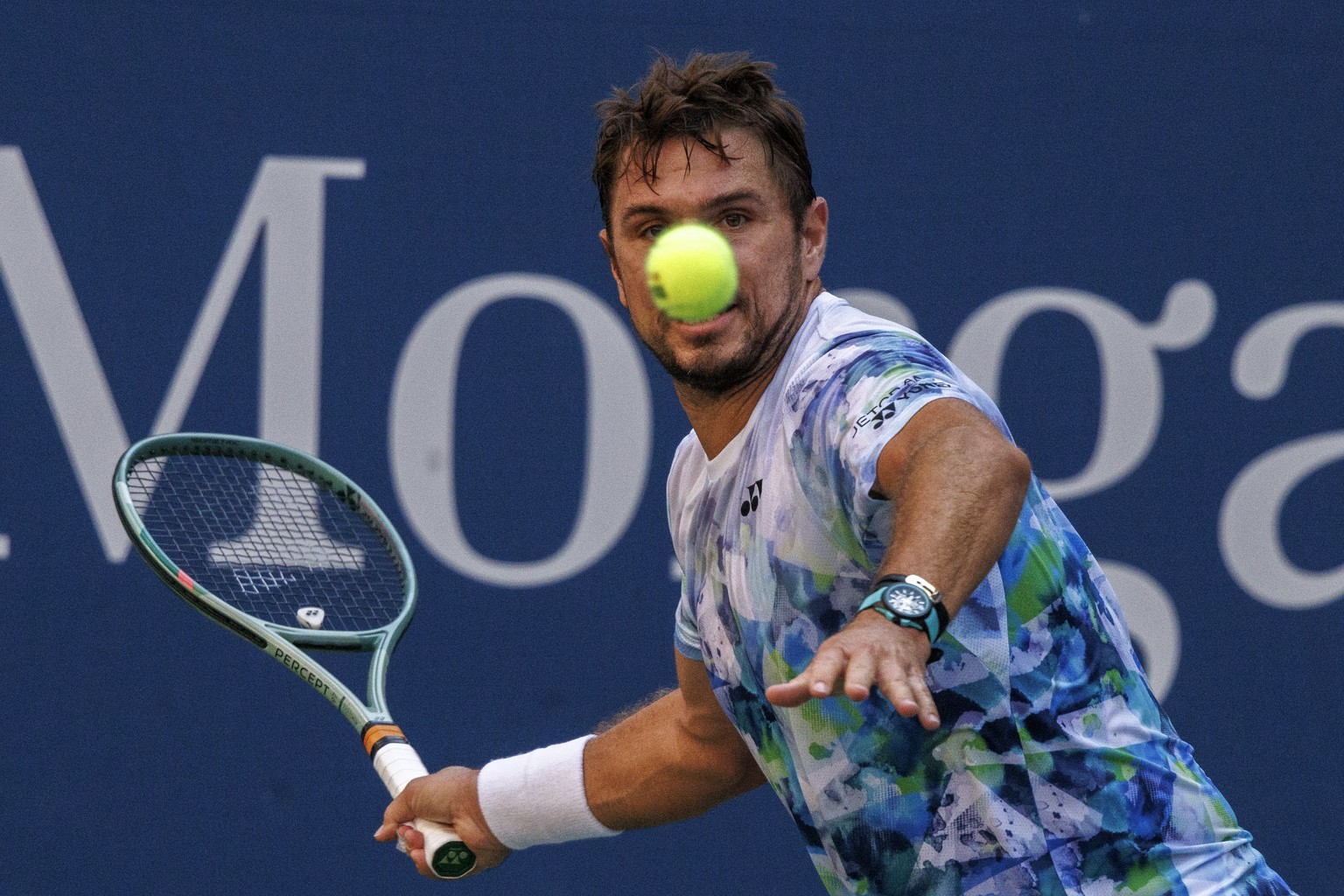 epa10836758 Stan Wawrinka of Switzerland returns the ball to Jannik Sinner of Italy during their third round match at the US Open Tennis Championships at the USTA National Tennis Center in Flushing Me ...