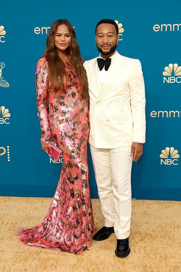 LOS ANGELES, CALIFORNIA - SEPTEMBER 12: (L-R) Chrissy Teigen and John Legend attend the 74th Primetime Emmys at Microsoft Theater on September 12, 2022 in Los Angeles, California. (Photo by Frazer Har ...