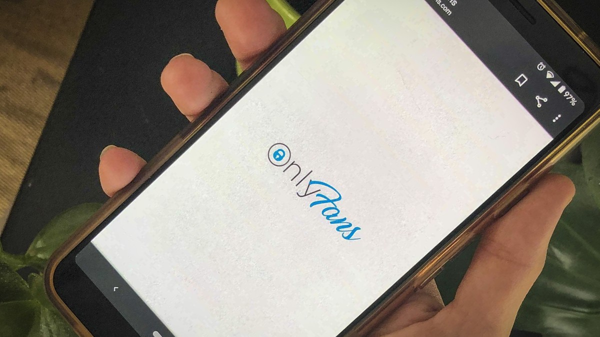 This photo shows a phone app for OnlyFans, a site where fans pay creators for their photos and videos, Thursday Aug. 19, 2021. A spokesperson says the site will ban "sexually explicit" start ...