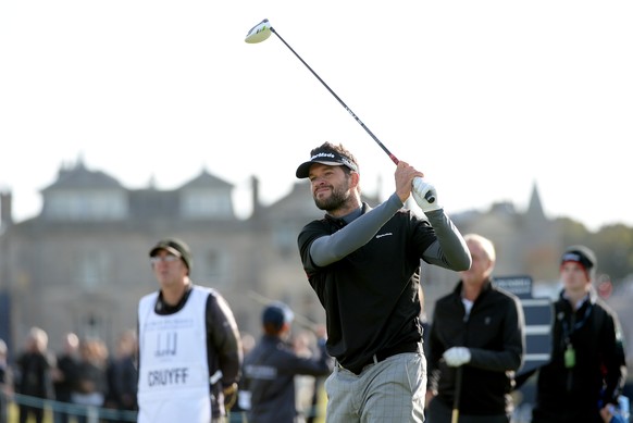 ST ANDREWS, SCOTLAND - OCTOBER 2: German football legend Michael Ballack plays off the second tee during the first round of the 2014 Alfred Dunhill Links Championship at The Old Course on October 2, 2 ...